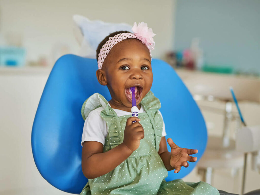 smiling baby at the dentist