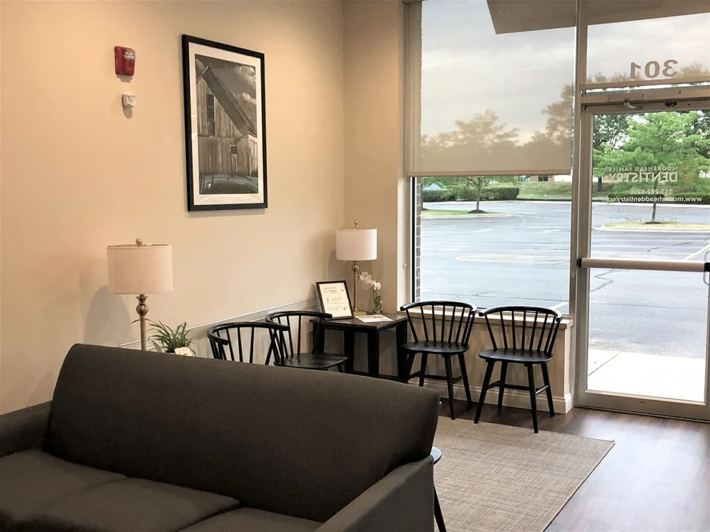Lobby of Moorehead Dentistry Lebanon, OH location, featuring a couch and chairs.